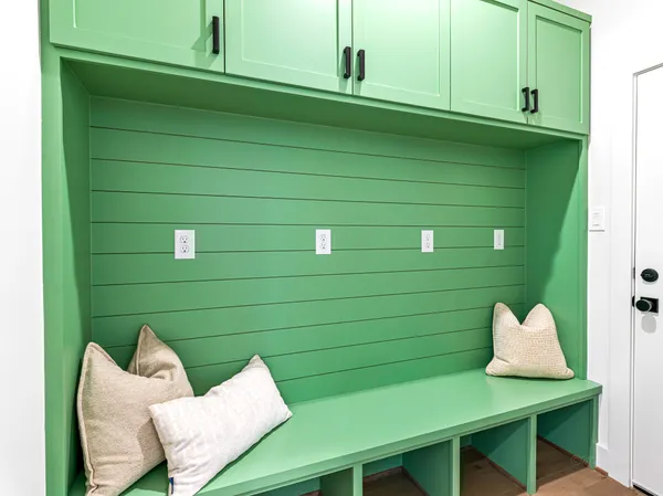 a kitchen with stainless steel appliances a stove a sink a counter space and cabinets