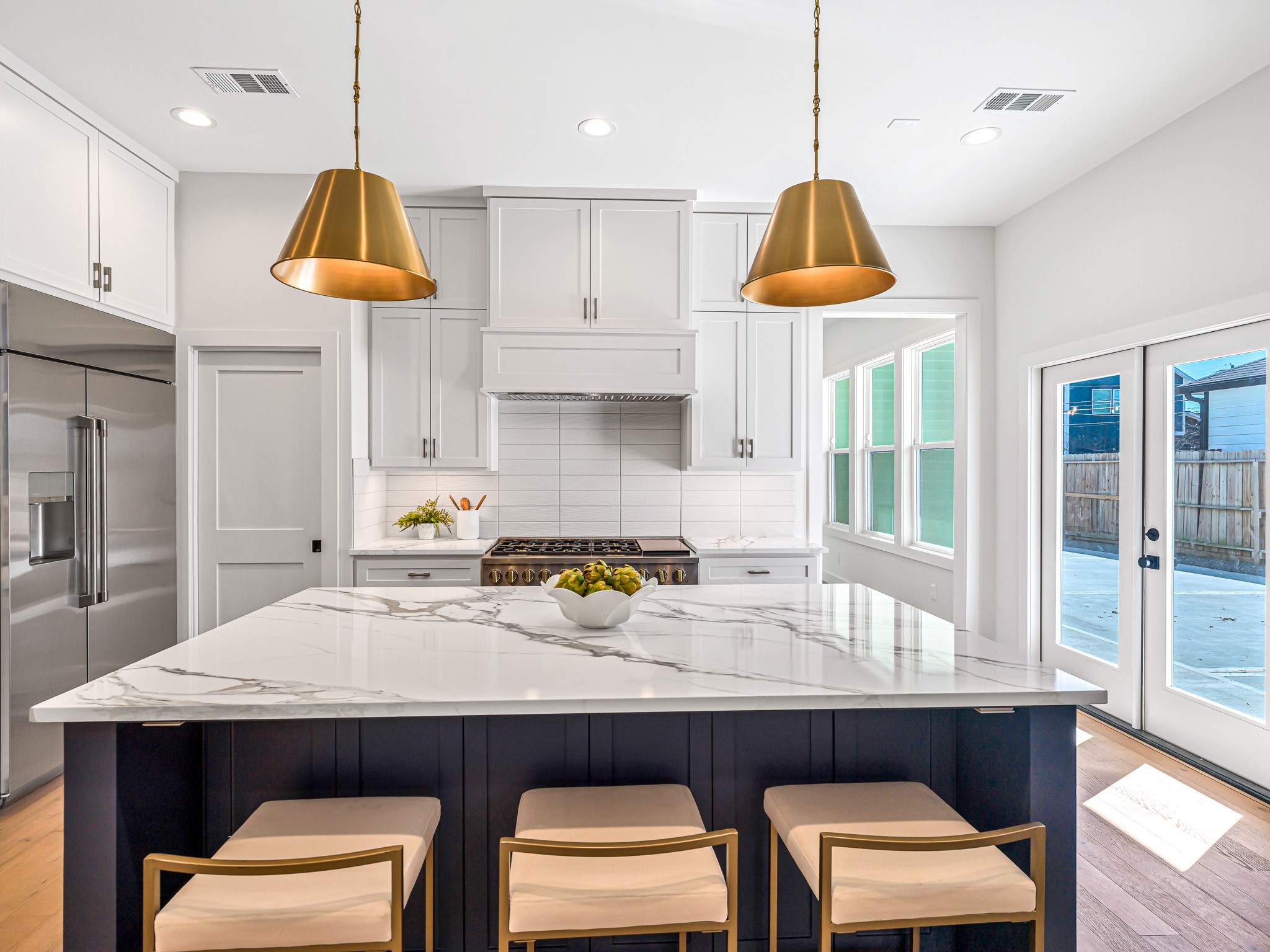 1207 Tabor Street Houston, TX 77009 - Photo 14 of 46 a kitchen with a sink cabinets and window