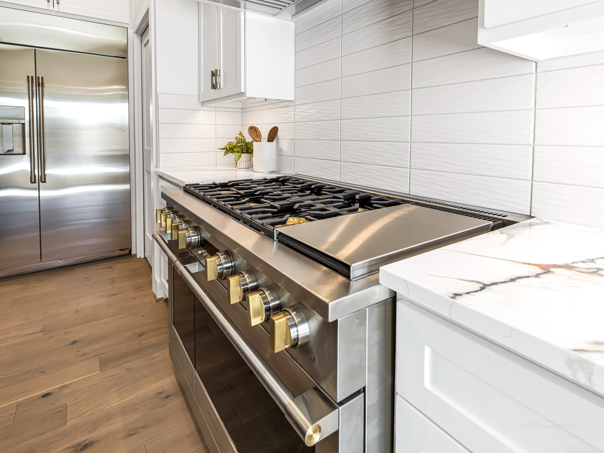 1207 Tabor Street Houston, TX 77009 - Photo 17 of 46 a stove top oven sitting inside of a kitchen