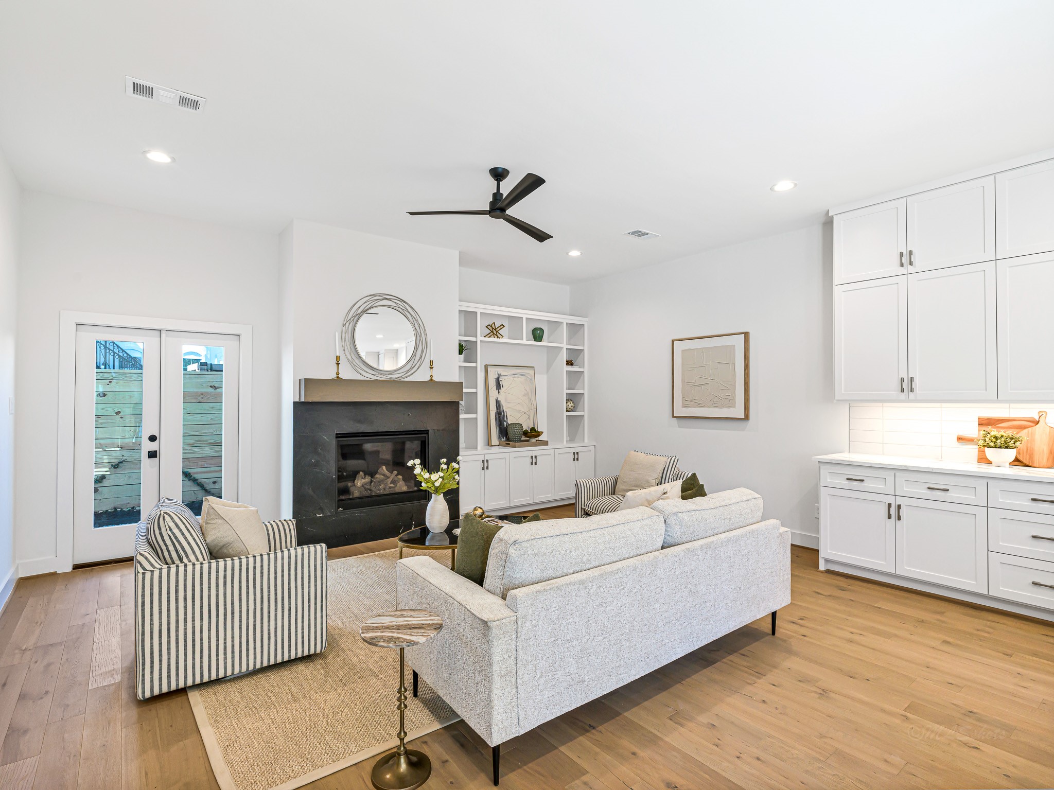 1207 Tabor Street Houston, TX 77009 - Photo 19 of 46 a living room with furniture and a fireplace