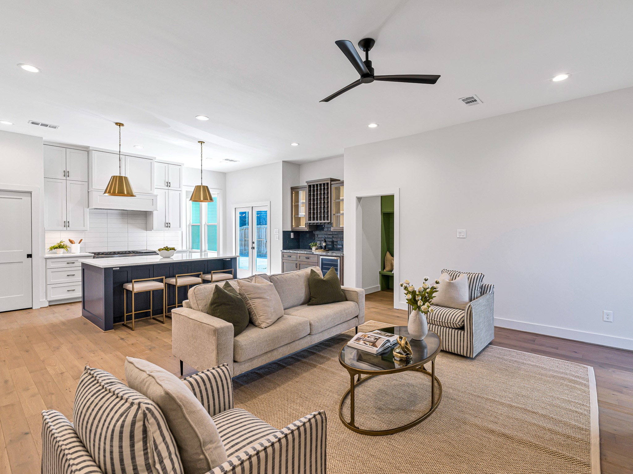 1207 Tabor Street Houston, TX 77009 - Photo 23 of 46 a living room with furniture and kitchen view