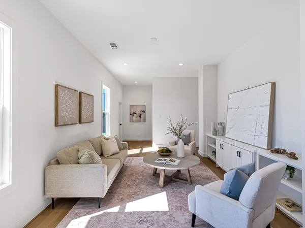 a living room with furniture and a couch