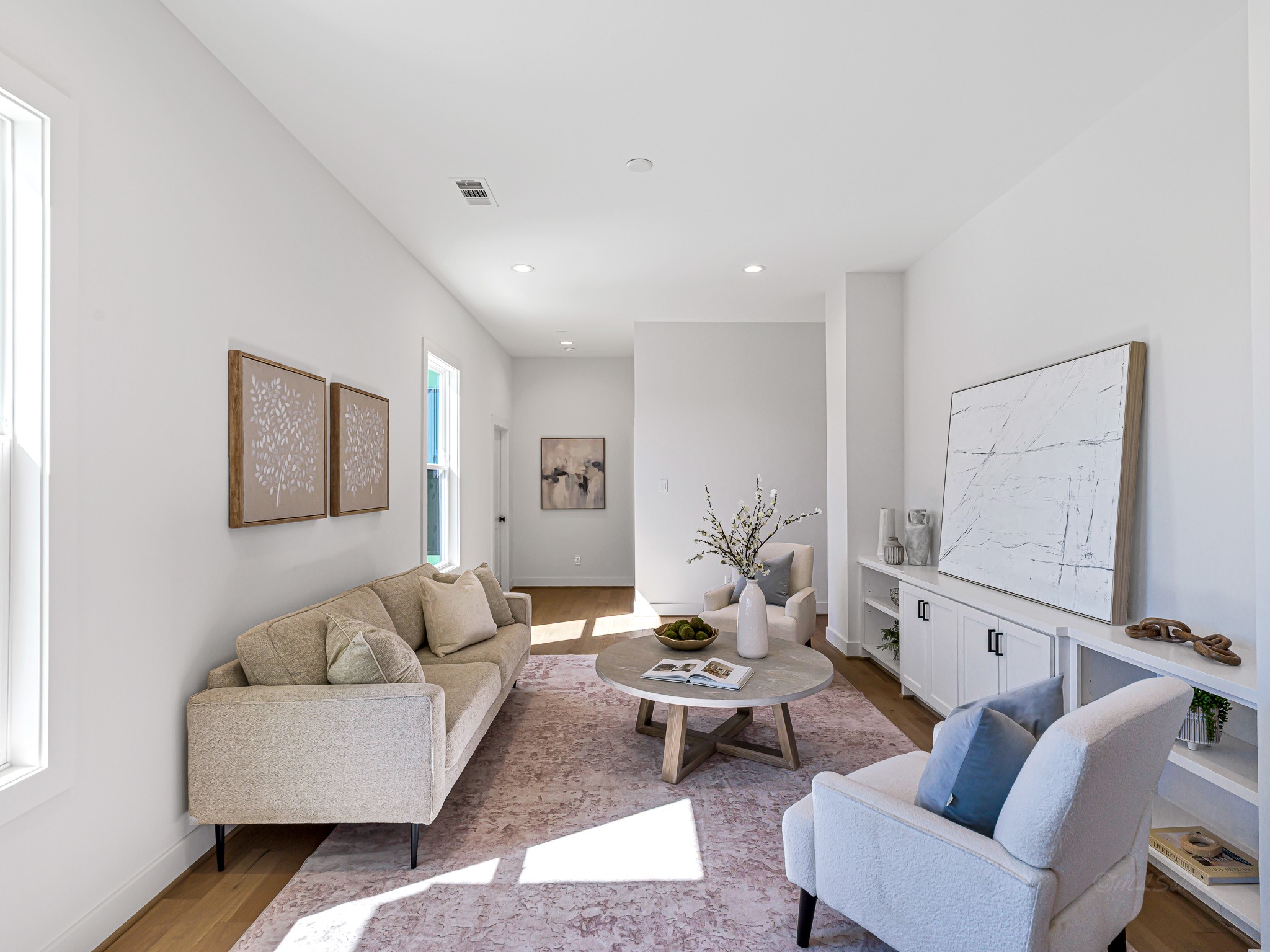 1207 Tabor Street Houston, TX 77009 - Photo 25 of 46 a living room with furniture and wooden floor