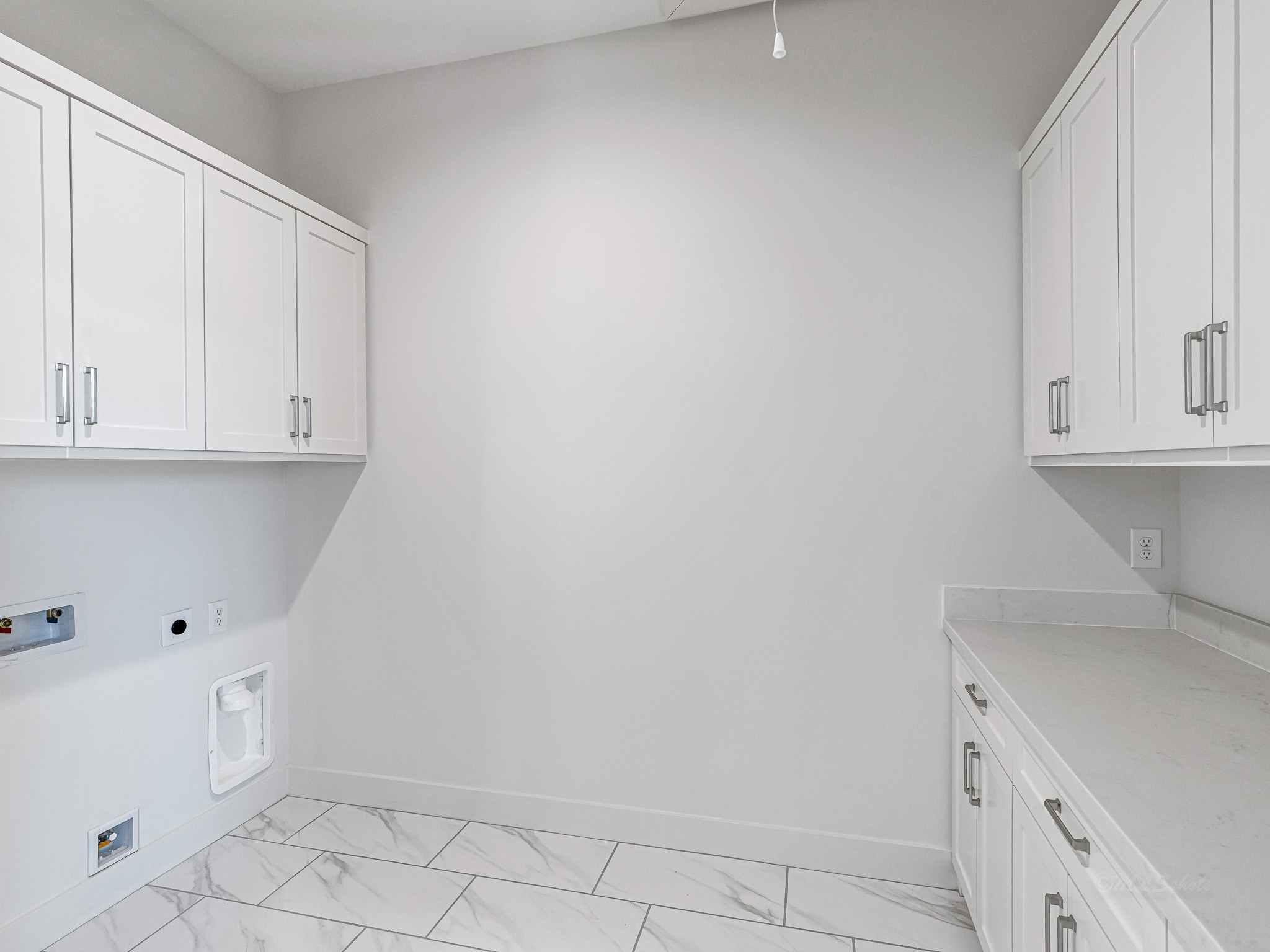 1207 Tabor Street Houston, TX 77009 - Photo 27 of 46 a view of cabinets and utility room with window