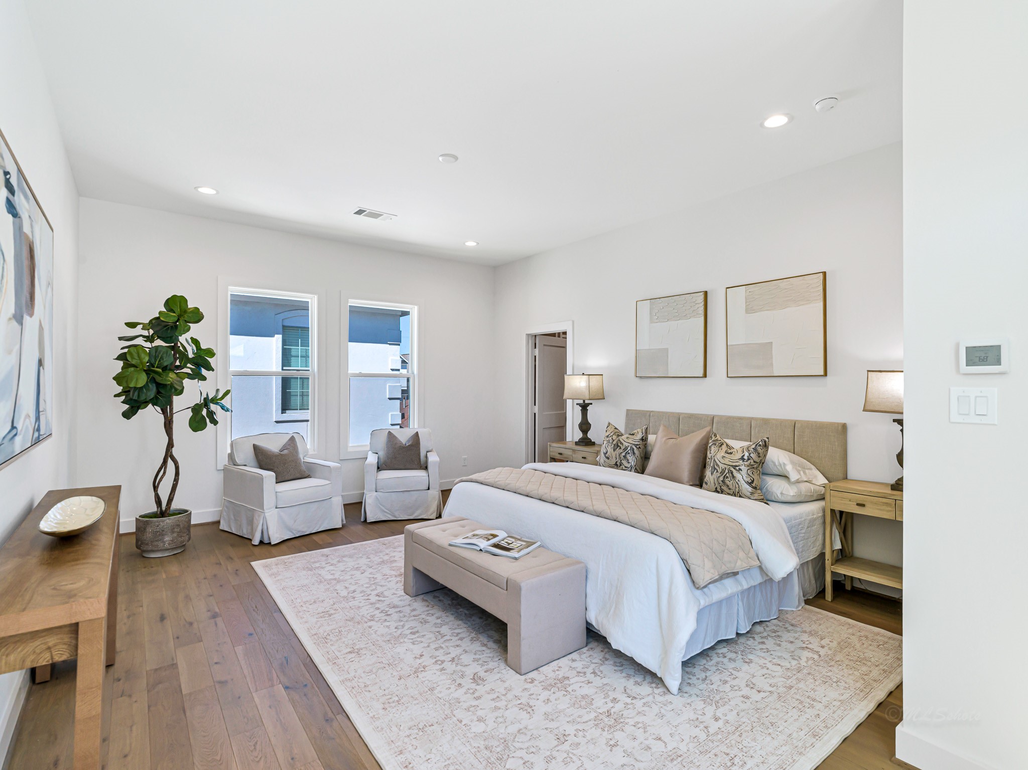 1207 Tabor Street Houston, TX 77009 - Photo 28 of 46 a bedroom with a bed couch and potted plant