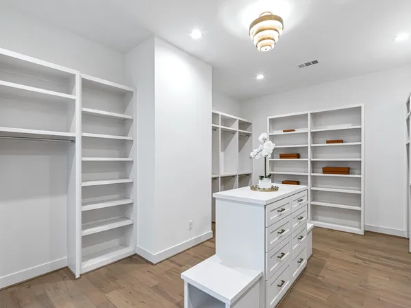 a bathroom with a double vanity sink mirror double and shower