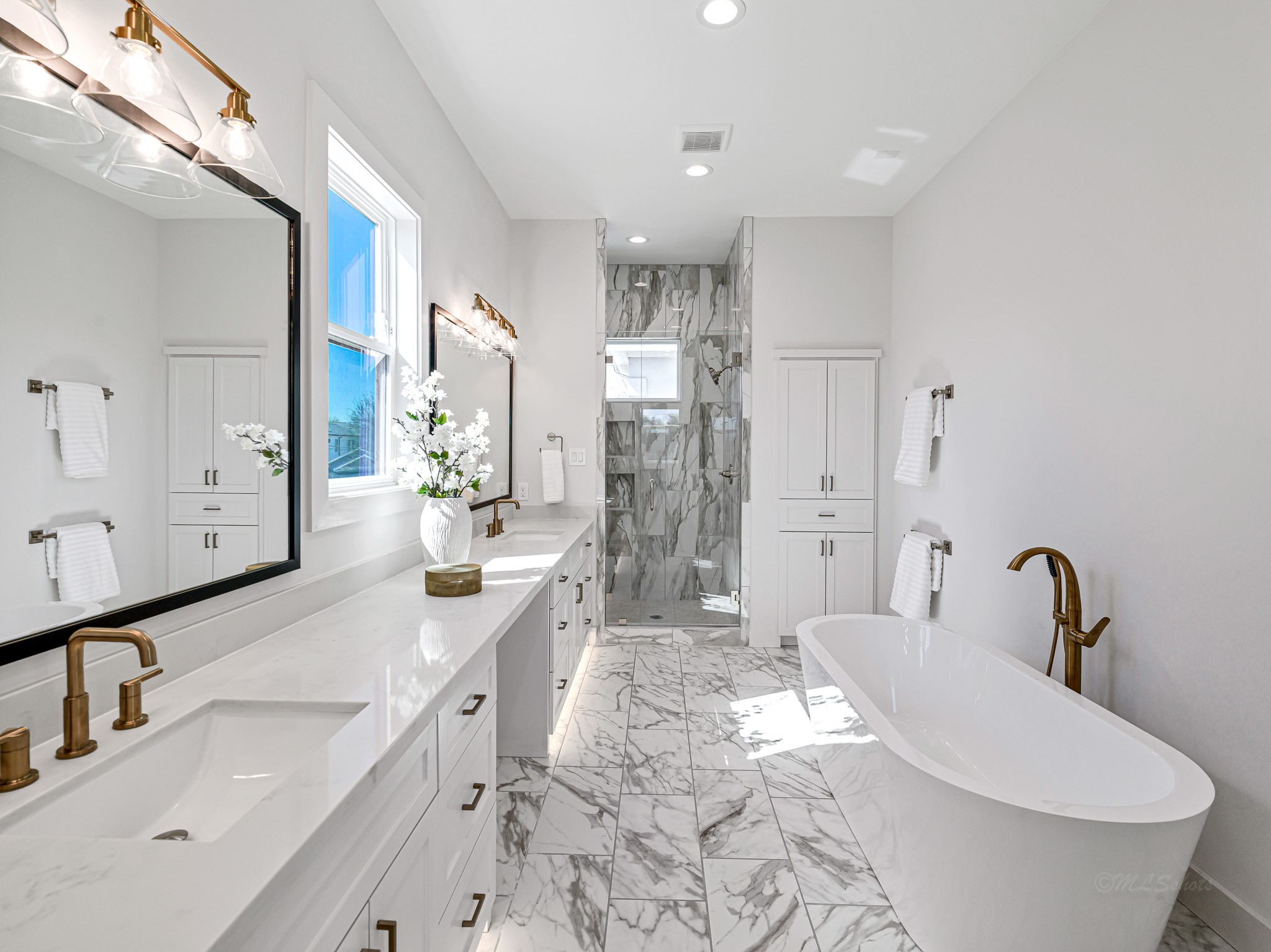 1207 Tabor Street Houston, TX 77009 - Photo 33 of 46 a bathroom with a double vanity sink mirror double and shower