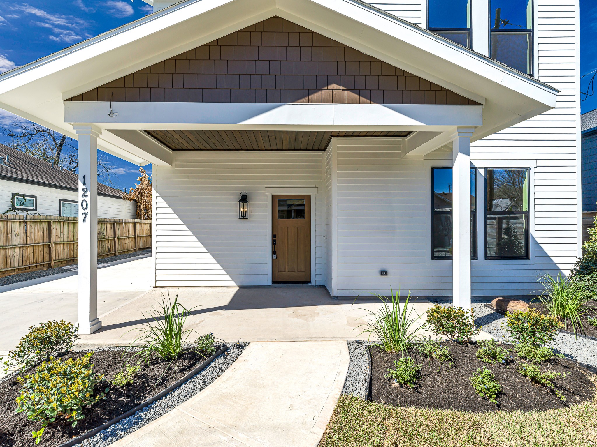 1207 Tabor Street Houston, TX 77009 - Photo 4 of 46 a front view of a house with a yard