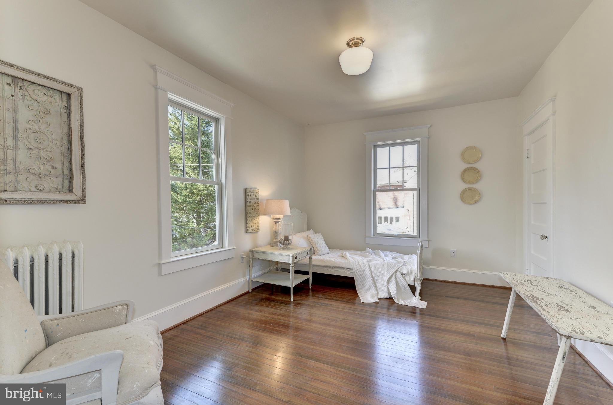 3816 Military Road Northwest Washington, DC 20015 - Photo 14 of 22 a living room with furniture and a window