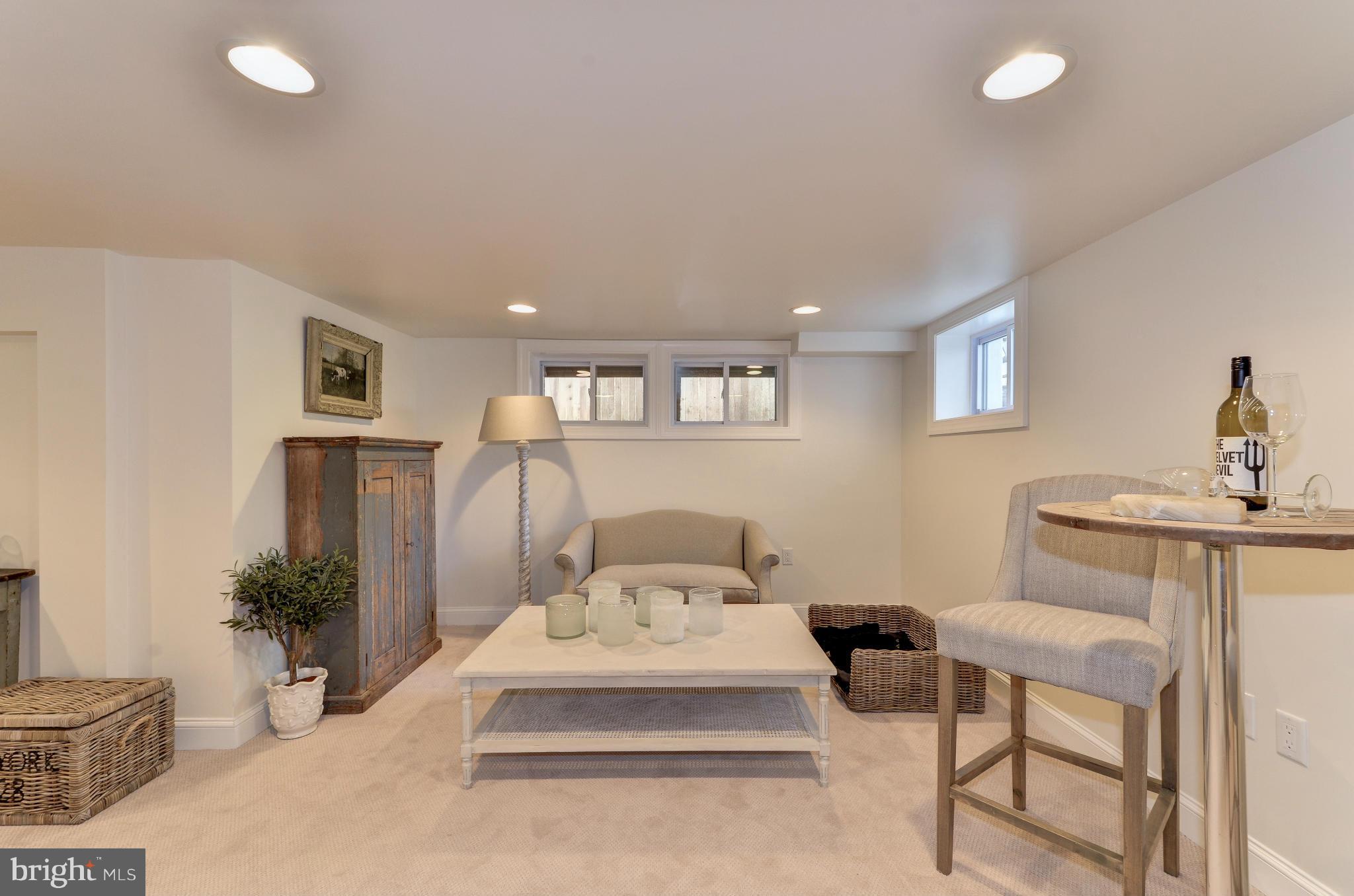 3816 Military Road Northwest Washington, DC 20015 - Photo 18 of 22 a bed room with a bed and a chair