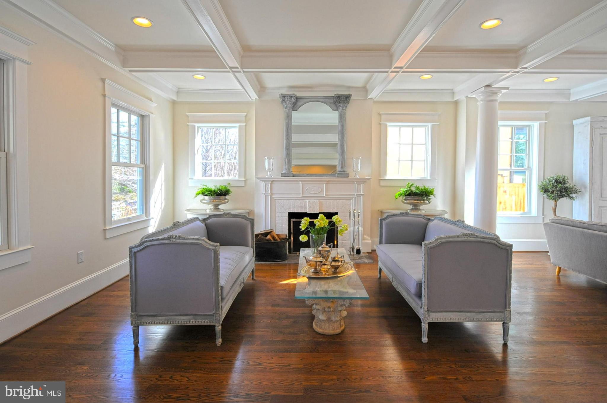 3816 Military Road Northwest Washington, DC 20015 - Photo 5 of 22 a living room with fireplace furniture and wooden floor
