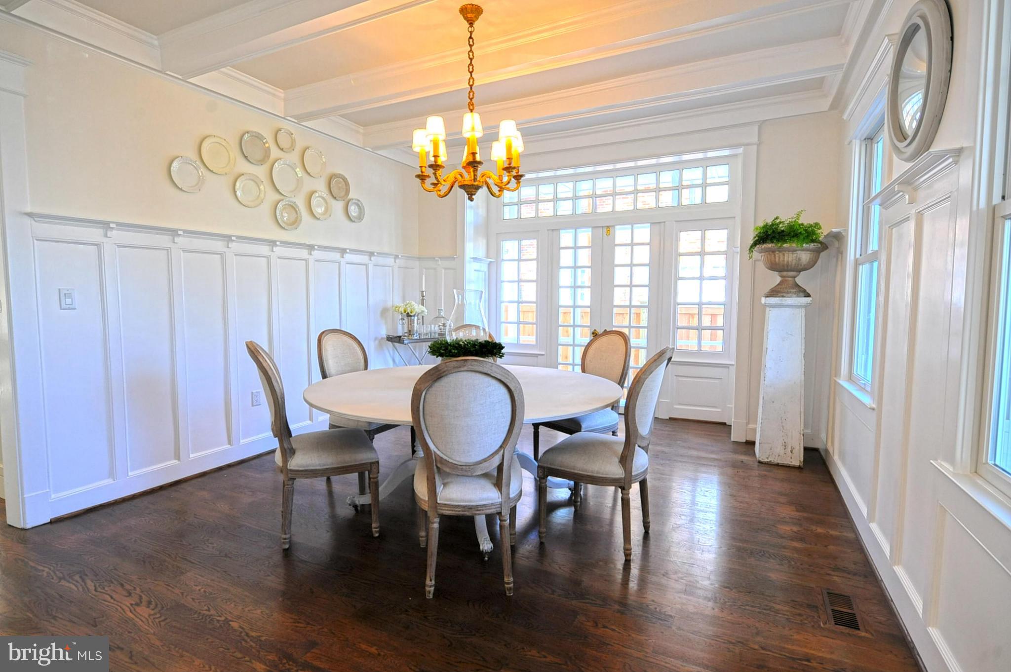 3816 Military Road Northwest Washington, DC 20015 - Photo 10 of 22 a view of a dining room with furniture wooden floor and chandelier