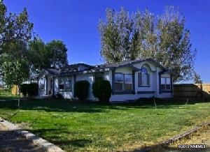 4543 Soda Lake Road Fallon, NV 89406 - Photo 1 of 1 a front view of a house with garden