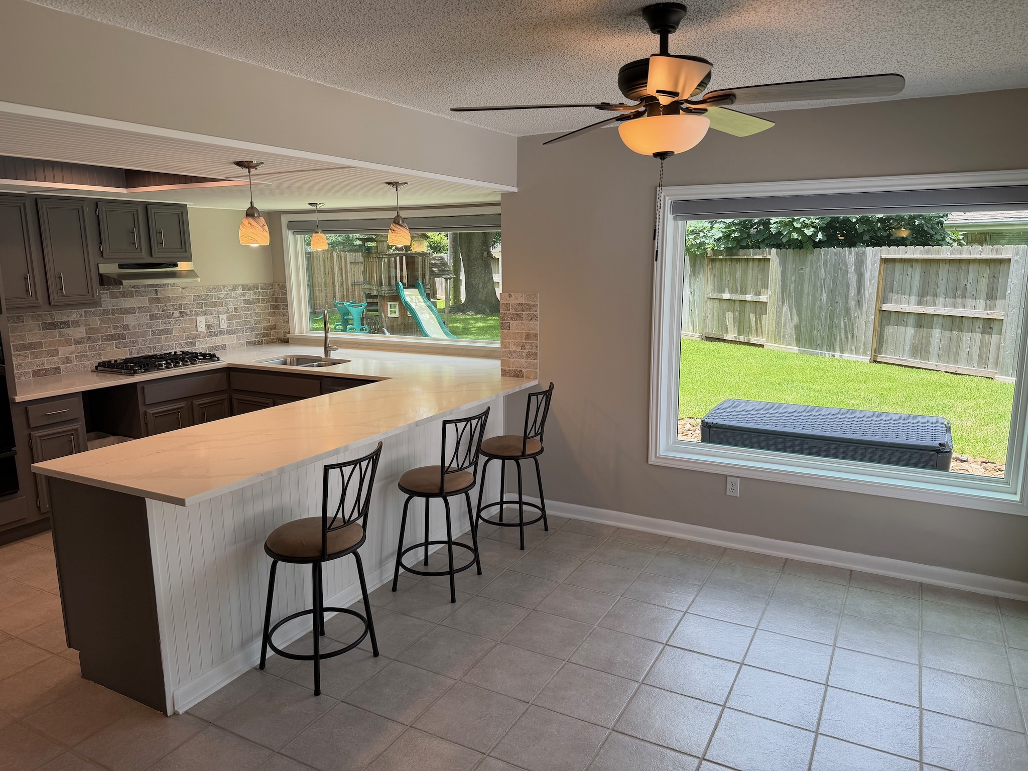 2326 Streamcrest Lane Sugar Land, TX 77479 - Photo 14 of 42 Large, plate glass windows provide fabulous view of backyard.