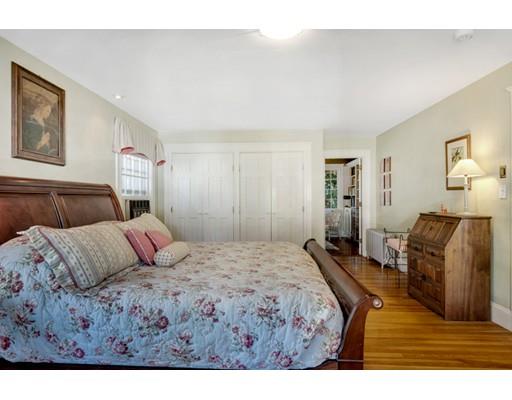 5 Pond Circle Boston, MA 02130 - Photo 15 of 27 a bedroom with a bed and a couch