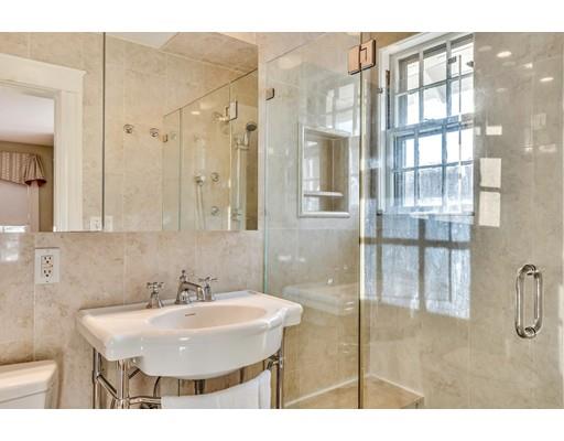 5 Pond Circle Boston, MA 02130 - Photo 17 of 27 a bathroom with a sink shower and a mirror
