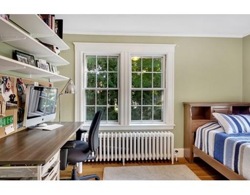 5 Pond Circle Boston, MA 02130 - Photo 21 of 27 a bedroom with furniture and a window