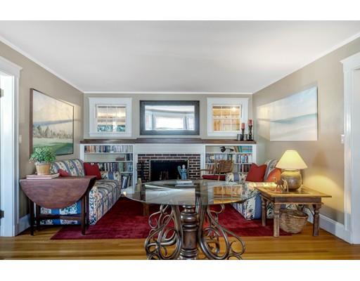 5 Pond Circle Boston, MA 02130 - Photo 3 of 27 a living room with furniture and a fireplace