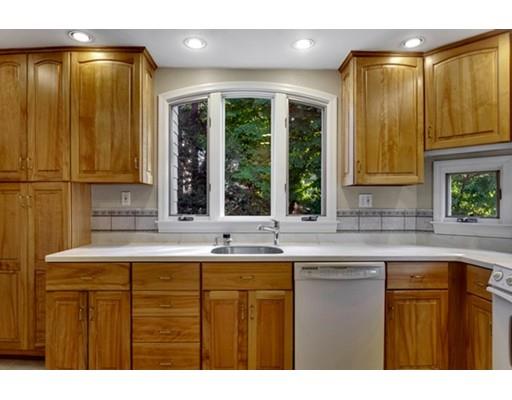 5 Pond Circle Boston, MA 02130 - Photo 10 of 27 a kitchen with a sink a window and cabinets
