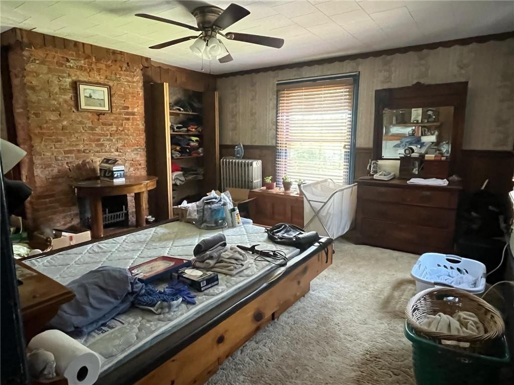 340 Mine Hill Road Adah, PA 15410 - Photo 16 of 23 a living room with furniture and a fireplace