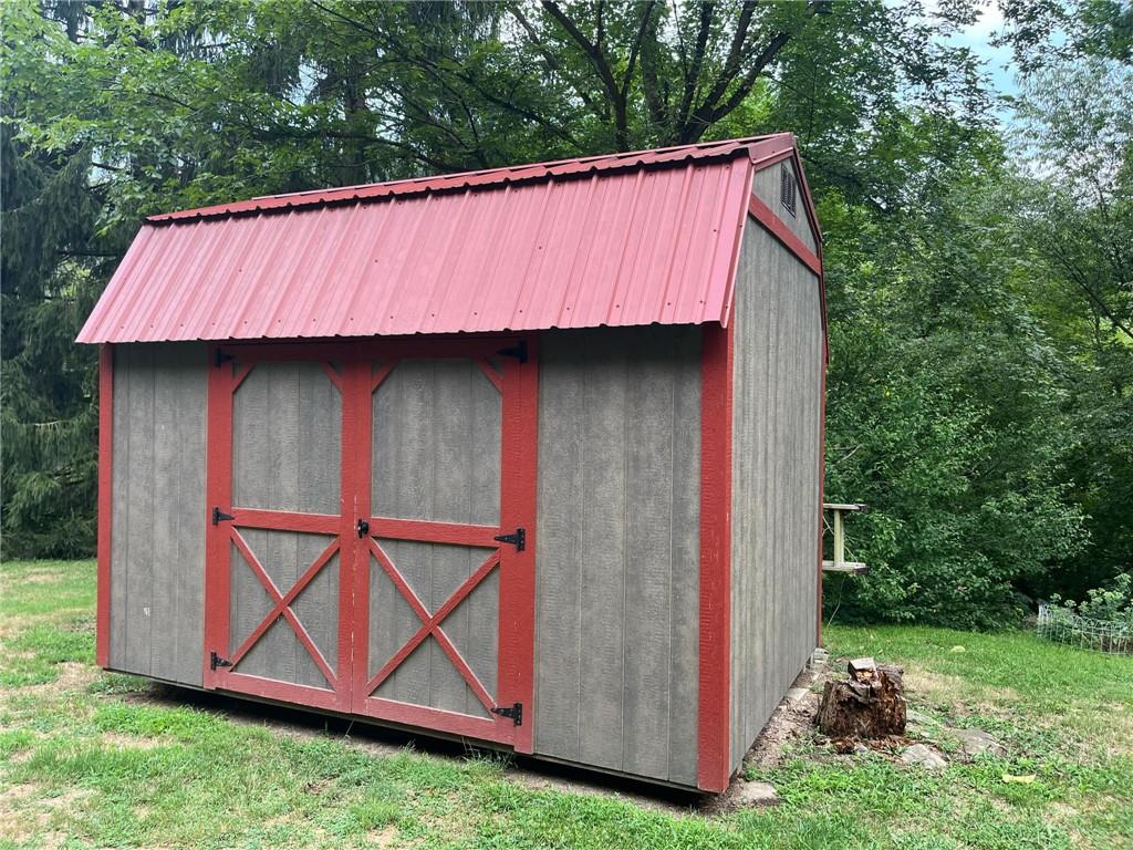 340 Mine Hill Road Adah, PA 15410 - Photo 19 of 23 a view of backyard of house with wooden fence