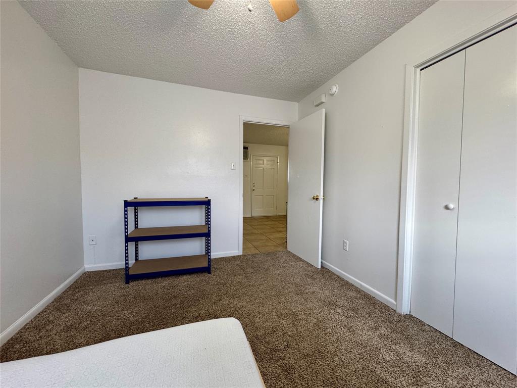1415 Sewell Street, Unit 1 Abilene, TX 79605 - Photo 12 of 15 a view of a livingroom with wooden floor and a potted plant