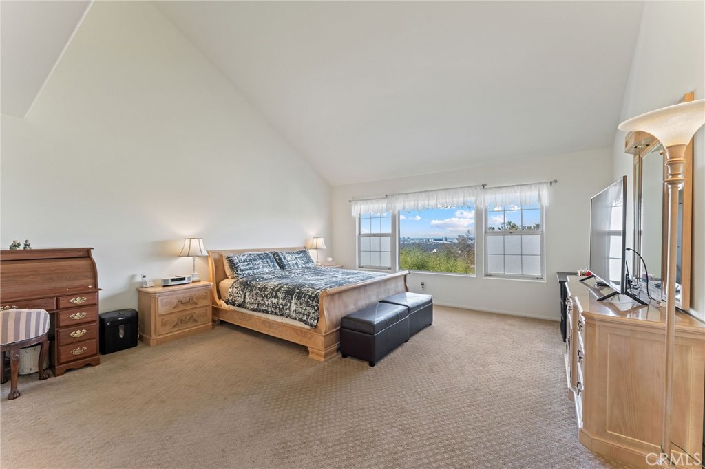 21 Centaurus Irvine, CA 92603 - Photo 27 of 65 a bed room with furniture and a flat screen tv