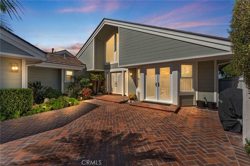 21 Centaurus Irvine, CA 92603 - Photo 4 of 65 a front view of house with yard outdoor seating and barbeque oven