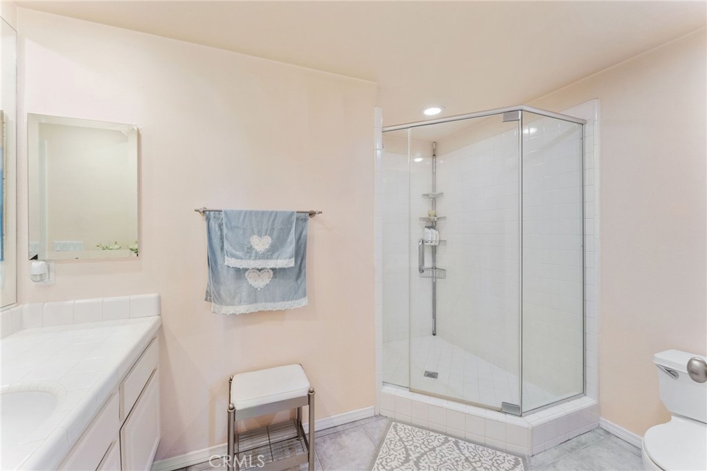 21 Centaurus Irvine, CA 92603 - Photo 43 of 65 a bathroom with a shower and a toilet