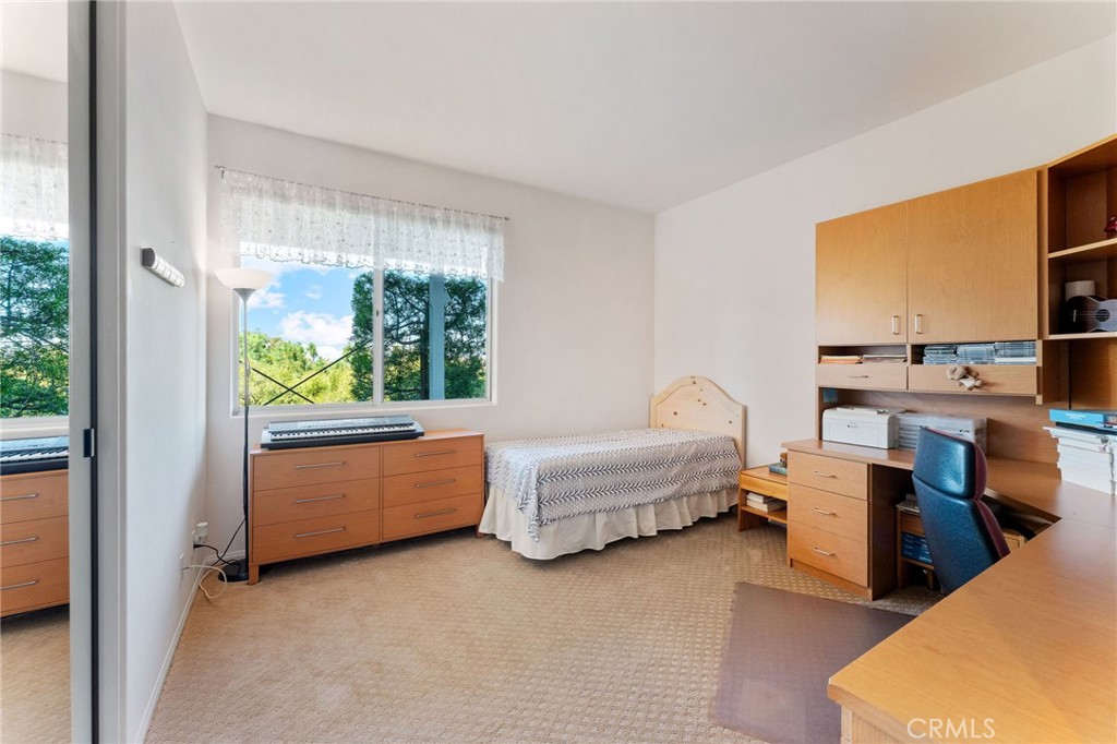 21 Centaurus Irvine, CA 92603 - Photo 44 of 65 a bedroom with furniture and window