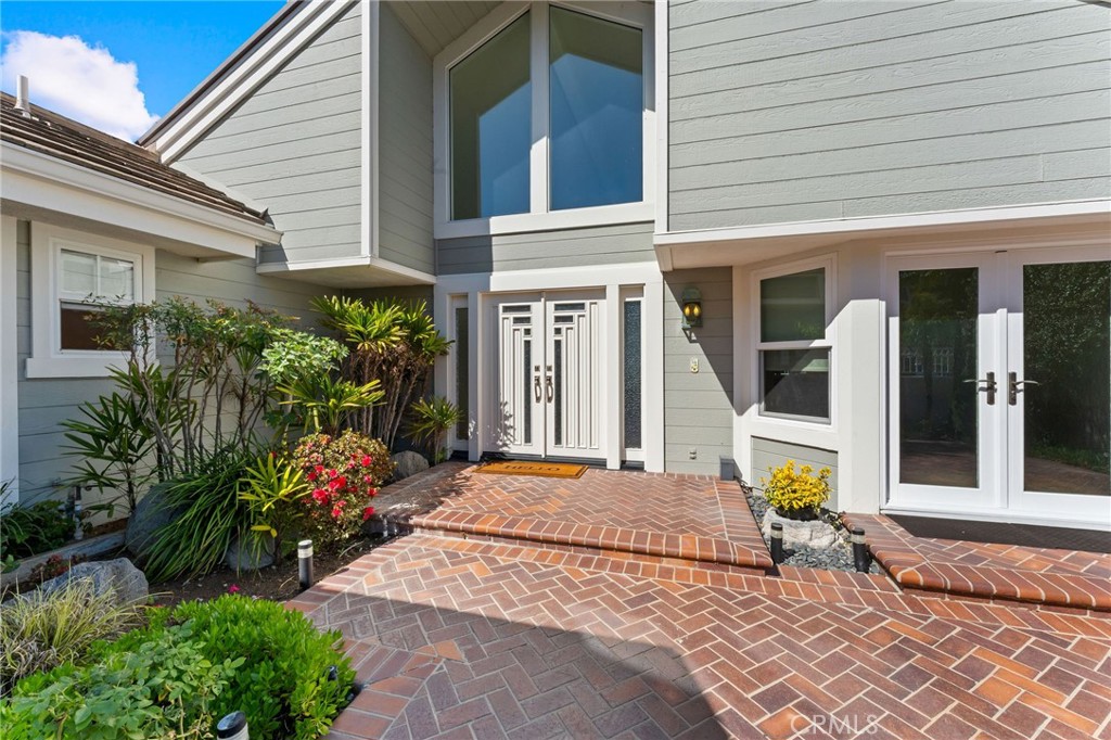 21 Centaurus Irvine, CA 92603 - Photo 5 of 65 a front view of a house with a porch