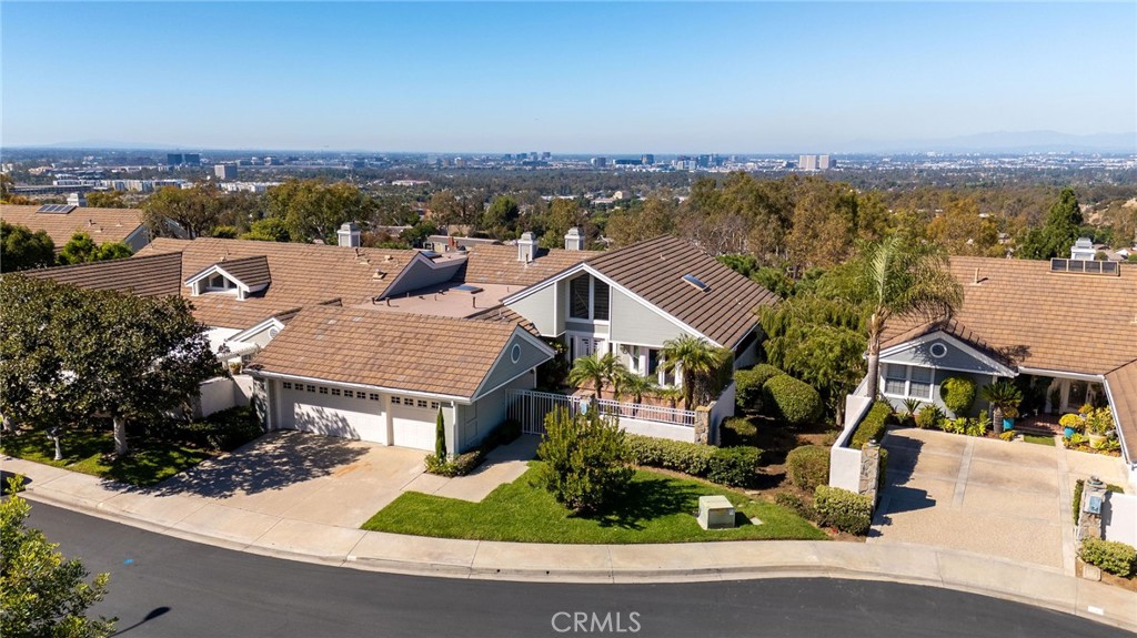 21 Centaurus Irvine, CA 92603 - Photo 55 of 65 an aerial view of residential houses with outdoor space and ocean view