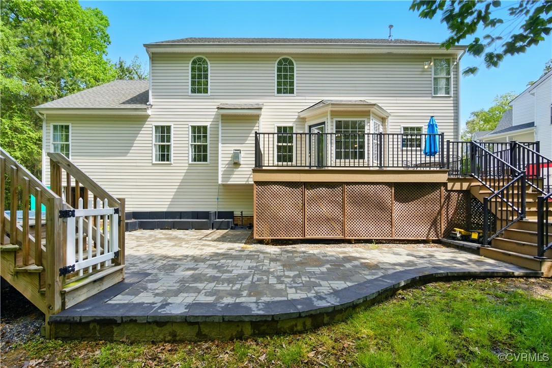 1360 Lomond Drive Midlothian, VA 23114 - Photo 21 of 33 Large deck overlooks the fenced back yard and wood