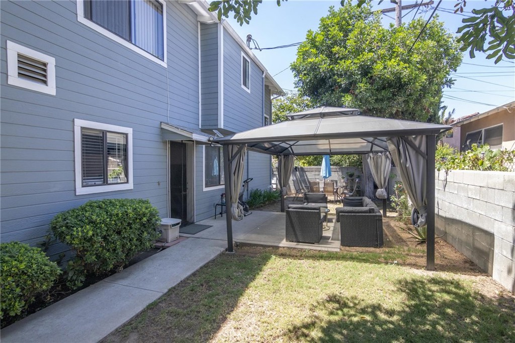 1031 Irving Avenue Glendale, CA 91201 - Photo 11 of 11 a view of a patio with table and chairs and potted plants