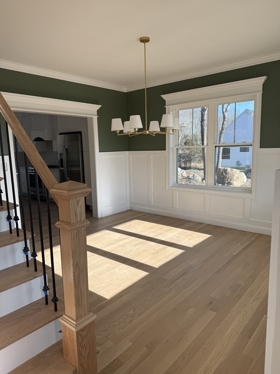 10 Muriel Way Rehoboth, MA 02769 - Photo 12 of 40 a view of empty room with wooden floor and fan