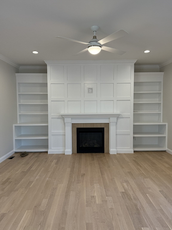 10 Muriel Way Rehoboth, MA 02769 - Photo 2 of 40 a view of an empty room with a fireplace and a window