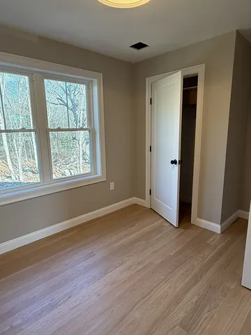 a view of an empty walk in closet