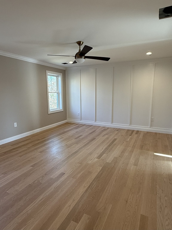 10 Muriel Way Rehoboth, MA 02769 - Photo 22 of 40 a view of an empty room with a window and wooden floor