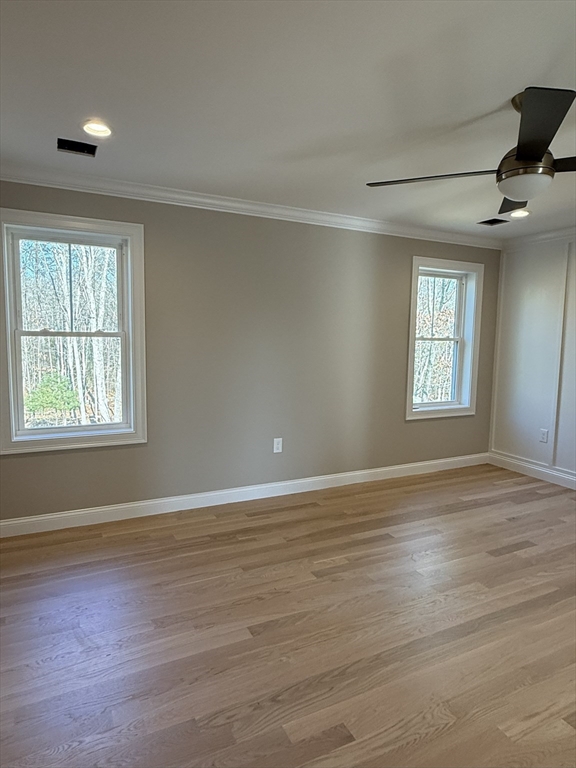 10 Muriel Way Rehoboth, MA 02769 - Photo 23 of 40 a view of an empty room with wooden floor and a window