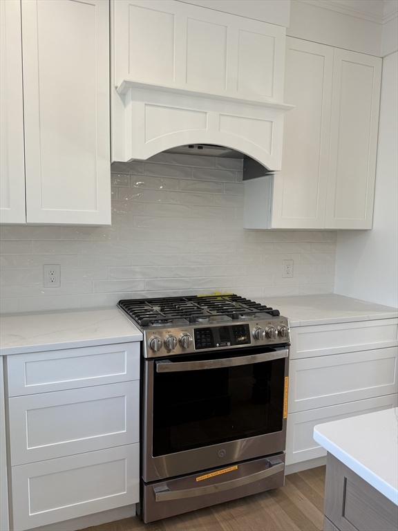 10 Muriel Way Rehoboth, MA 02769 - Photo 7 of 40 a stove top oven sitting inside of a kitchen