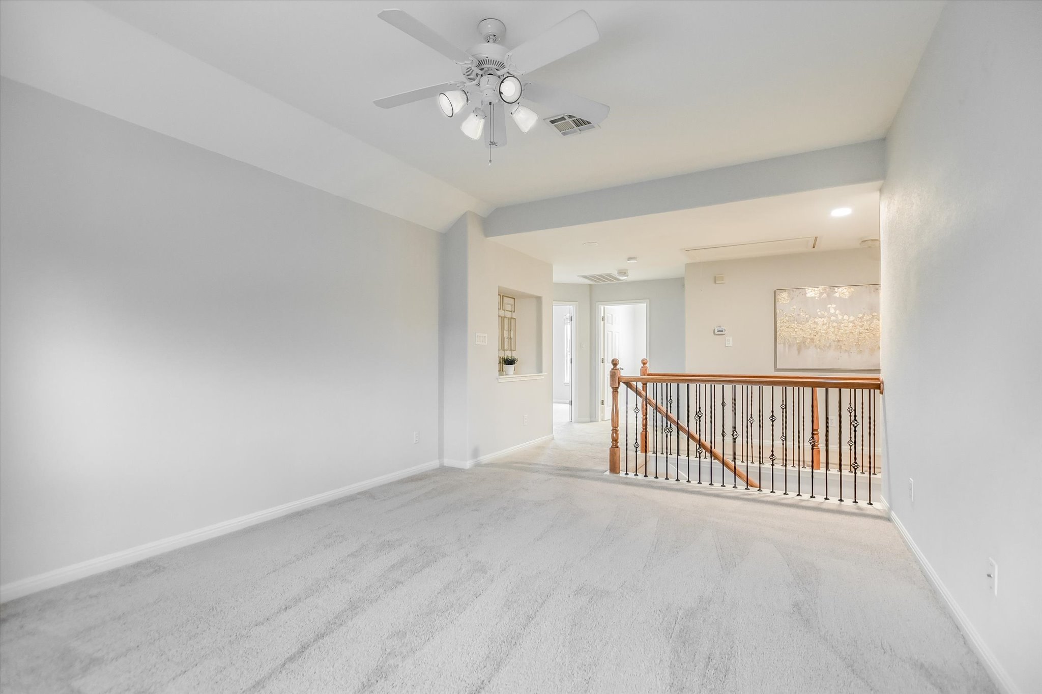 9409 Lisi Anne Drive Austin, TX 78717 - Photo 14 of 25 a view of a room with a ceiling fan and window