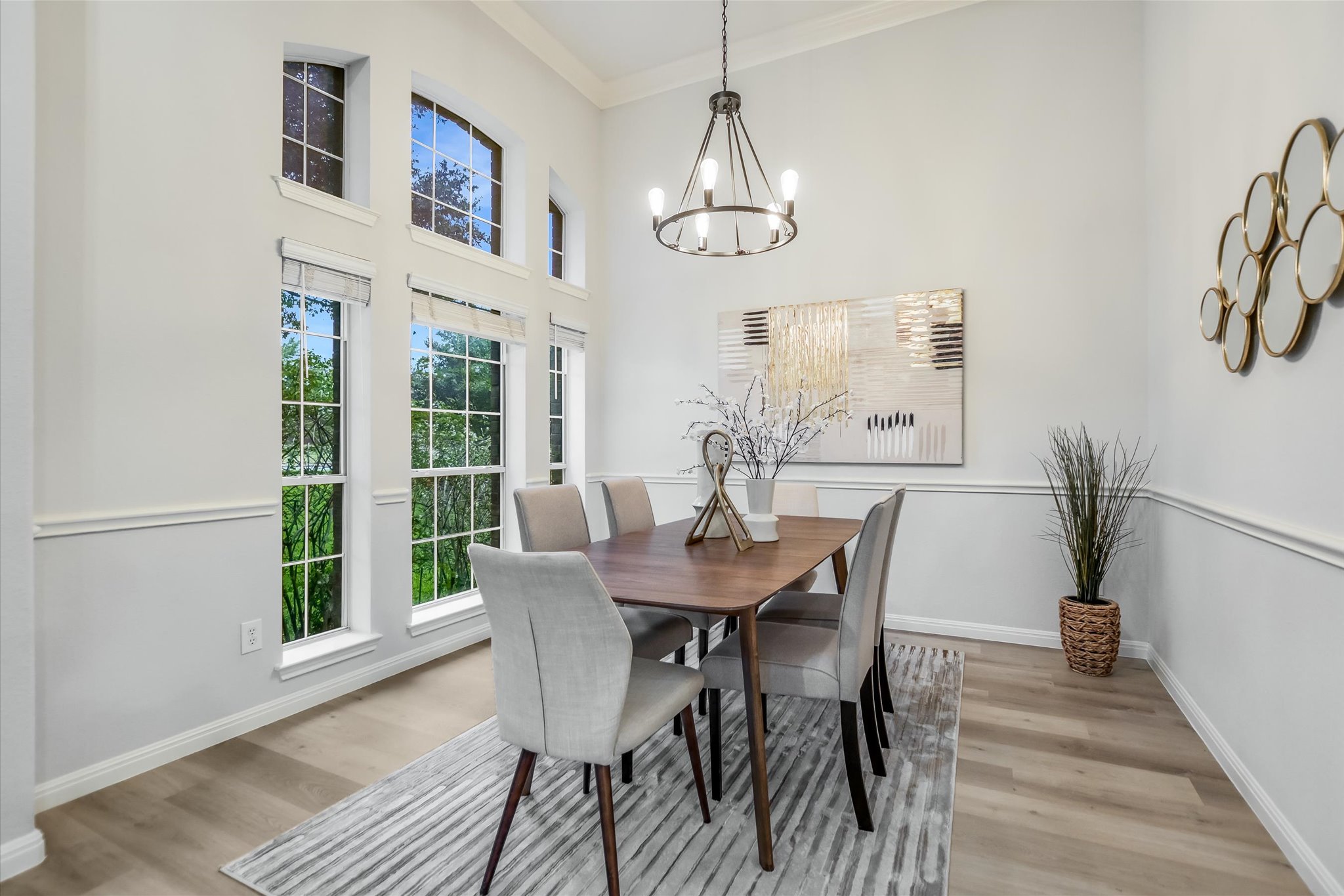9409 Lisi Anne Drive Austin, TX 78717 - Photo 3 of 25 a view of a dining room with furniture window and wooden floor