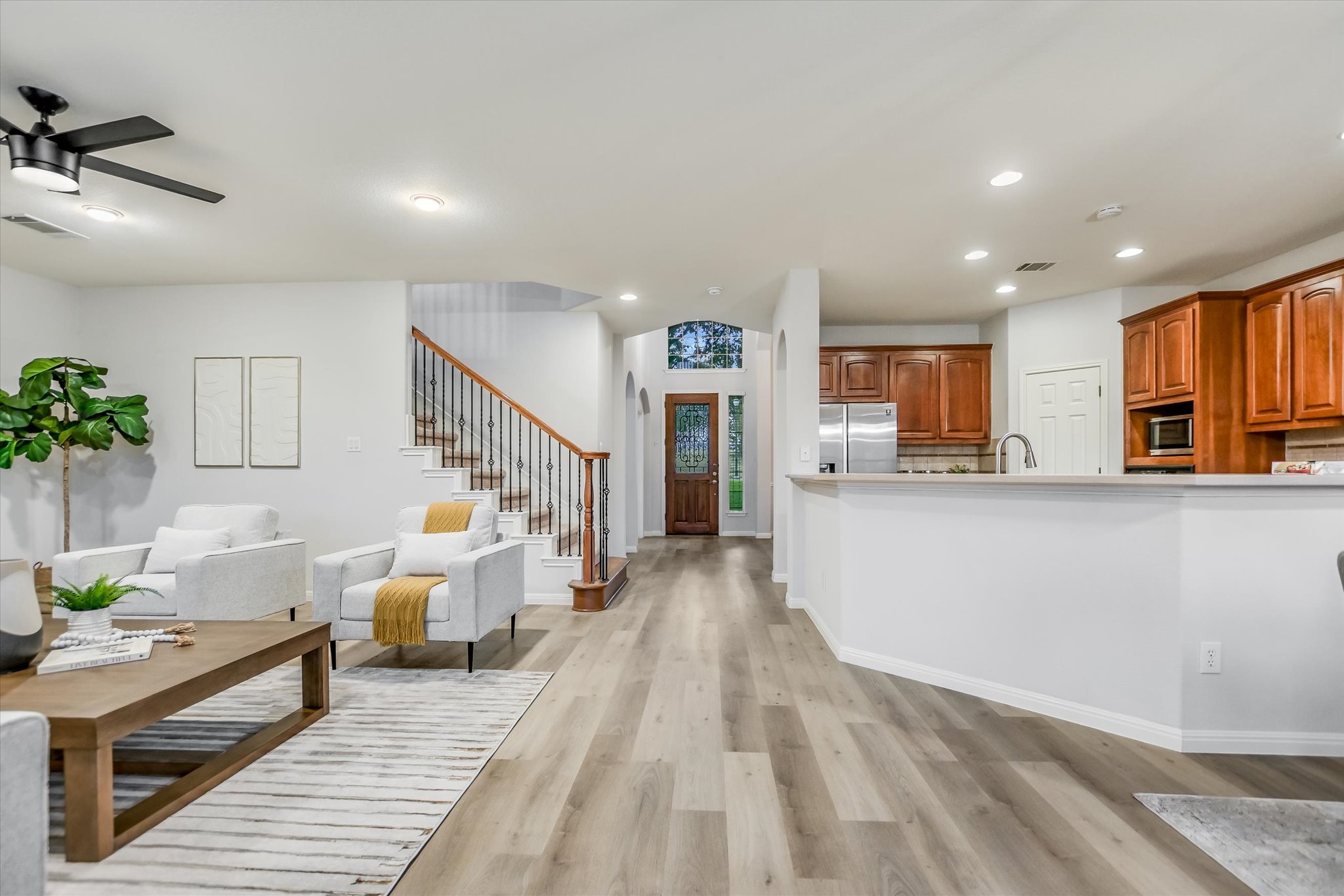 9409 Lisi Anne Drive Austin, TX 78717 - Photo 6 of 25 a living room with furniture and a kitchen view
