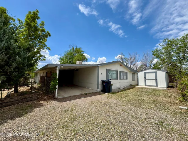 a house view with a outdoor space