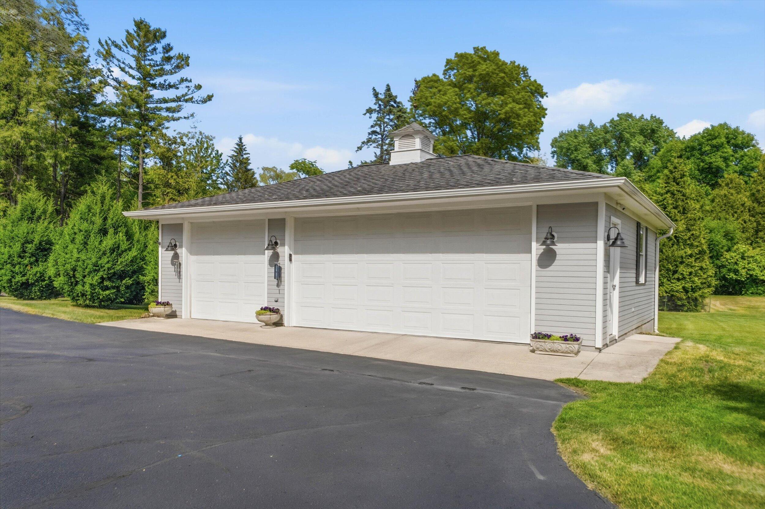 9431 Hawthorne Road Mequon, WI 53097 - Photo 55 of 67 3-car garage