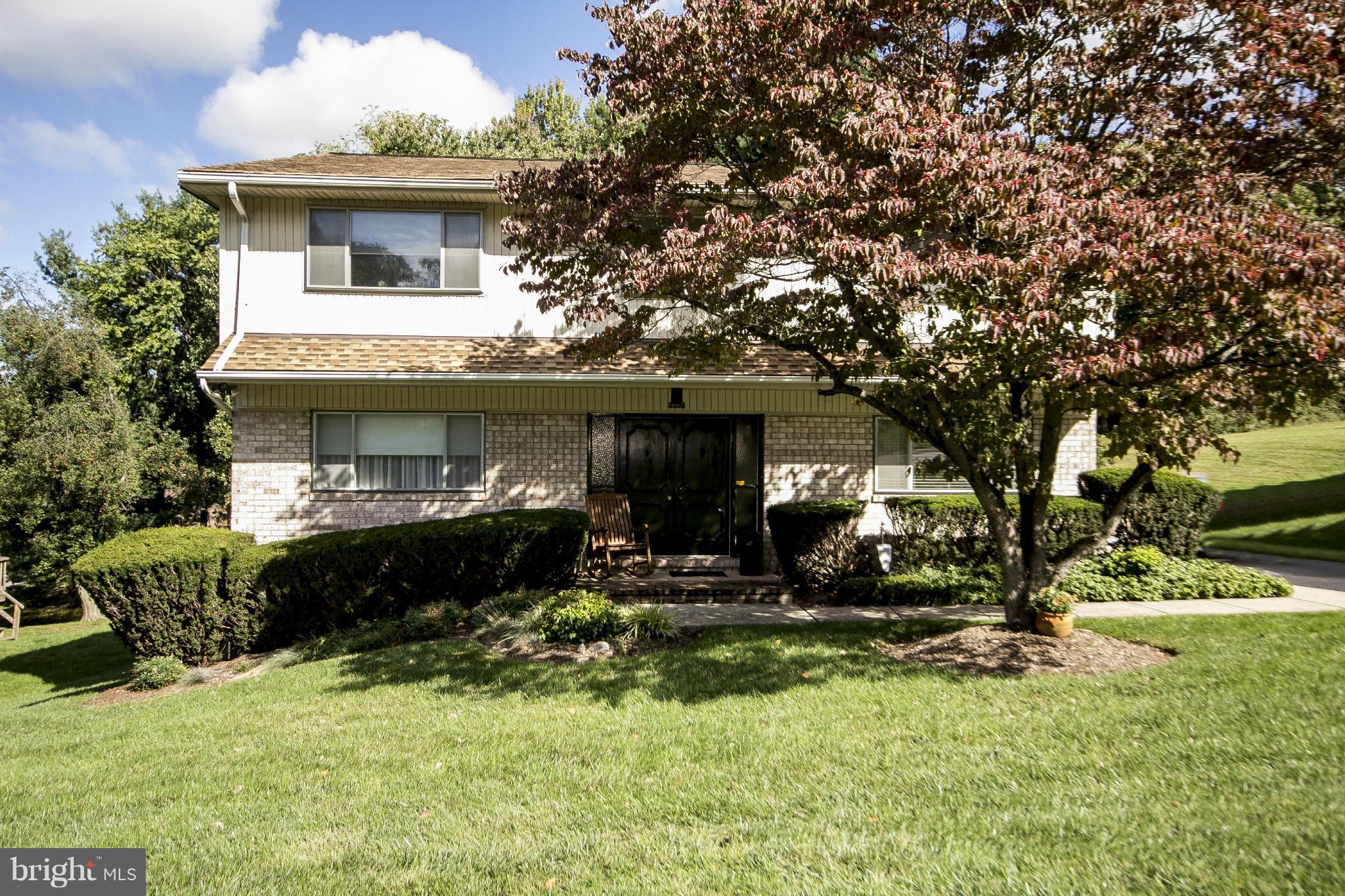 2208 Sugarcone Road Baltimore, MD 21209 - Photo 1 of 23 a front view of a house with a yard