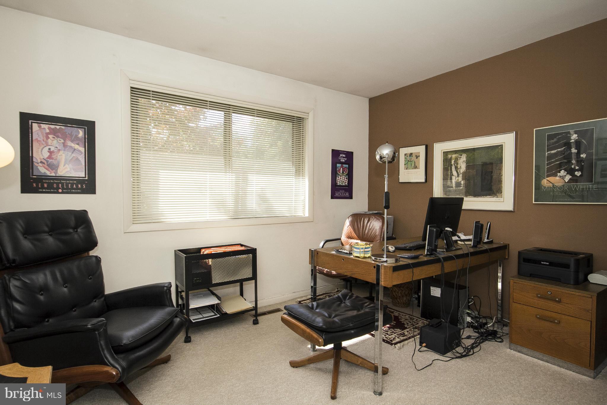 2208 Sugarcone Road Baltimore, MD 21209 - Photo 20 of 23 a livingroom with workspace and a couch