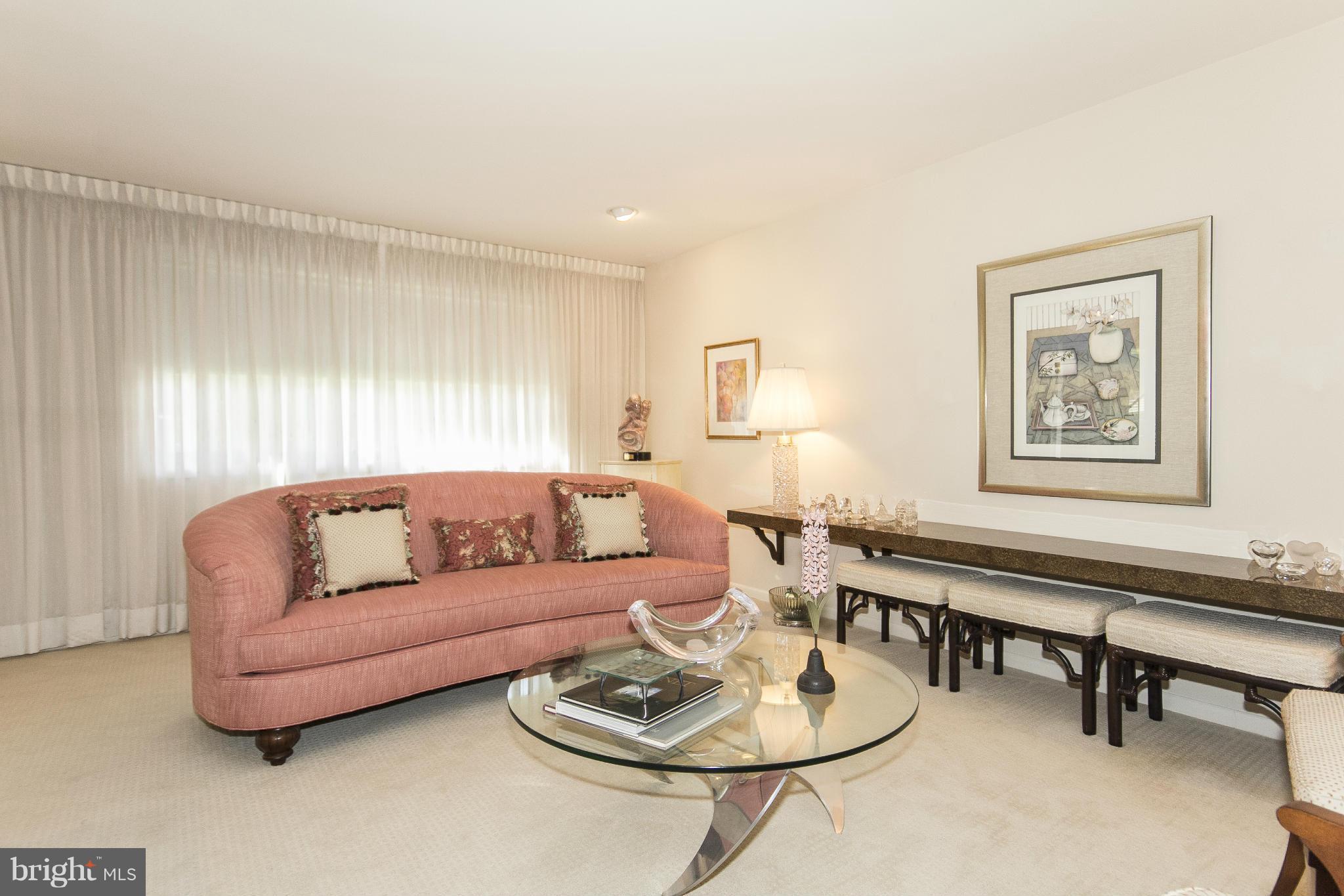 2208 Sugarcone Road Baltimore, MD 21209 - Photo 7 of 23 a living room with furniture and a table