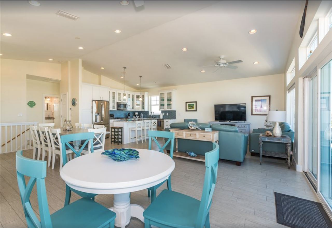 5349 Atlantic View St. Augustine, FL 32080 - Photo 12 of 33 a large kitchen with a table and chairs