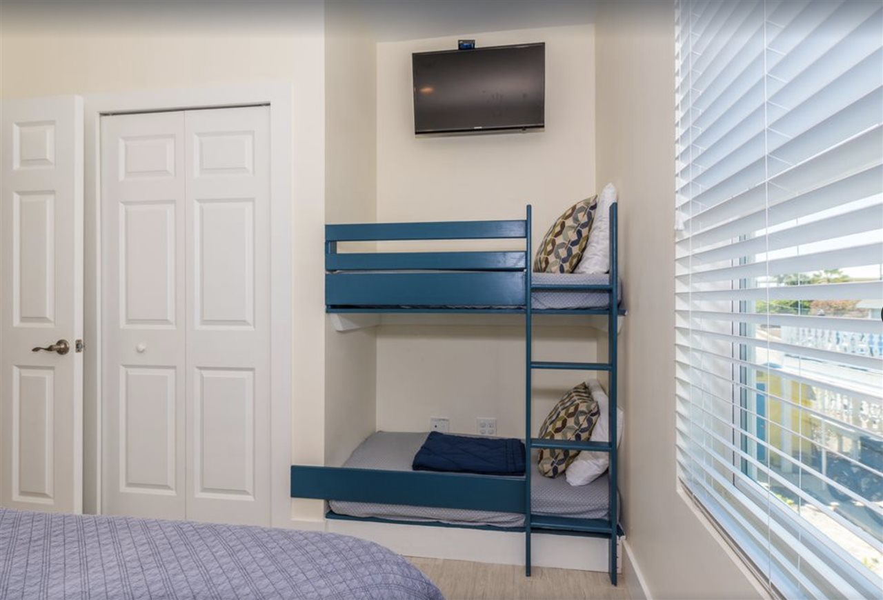 5349 Atlantic View St. Augustine, FL 32080 - Photo 25 of 33 a living room with furniture and a flat screen tv